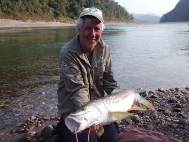 Chris Cleaver with his recently caught and released hybrid cod he likes to call a Murrout (cross between a Murray and trout cod).